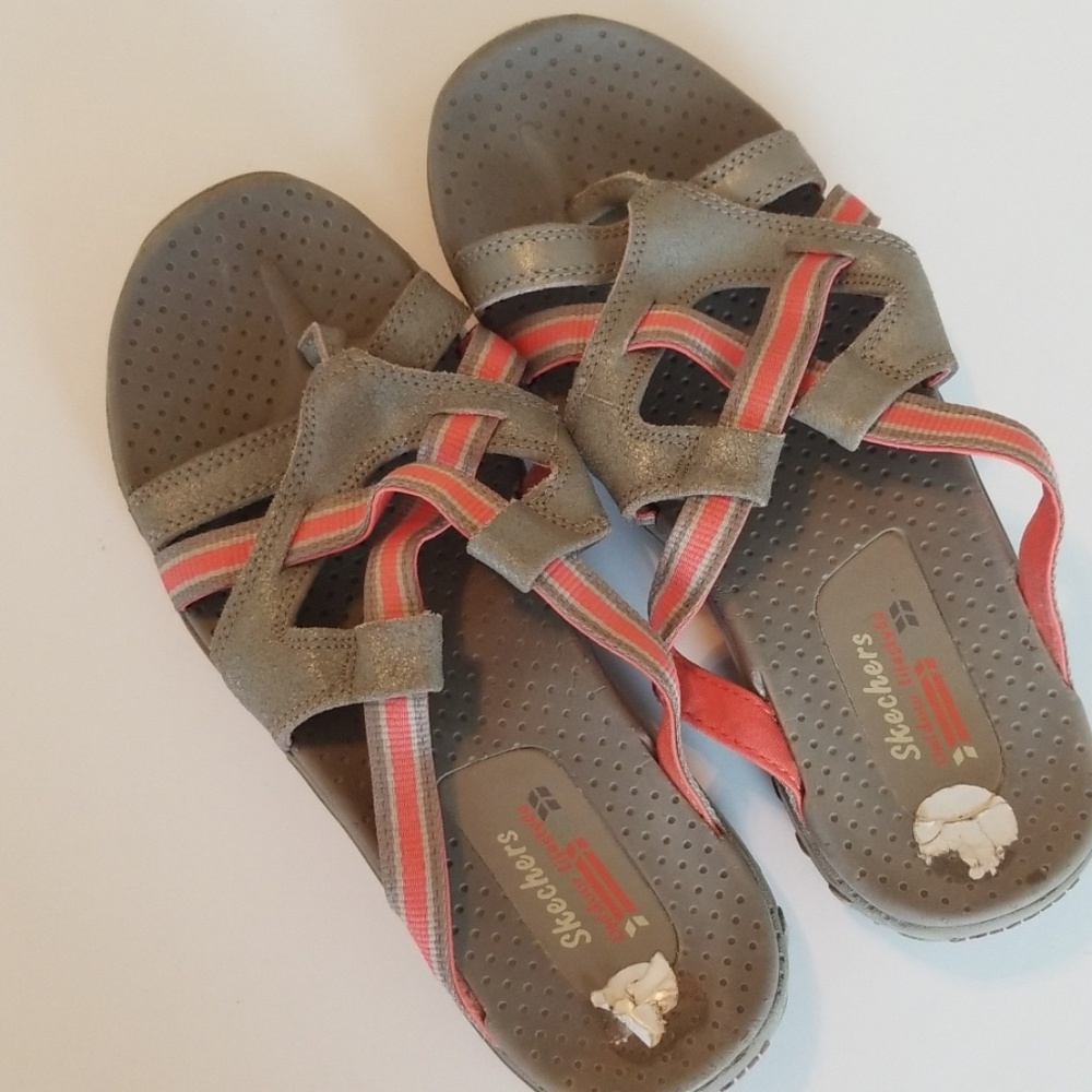 Tan and orange Skechers sandals